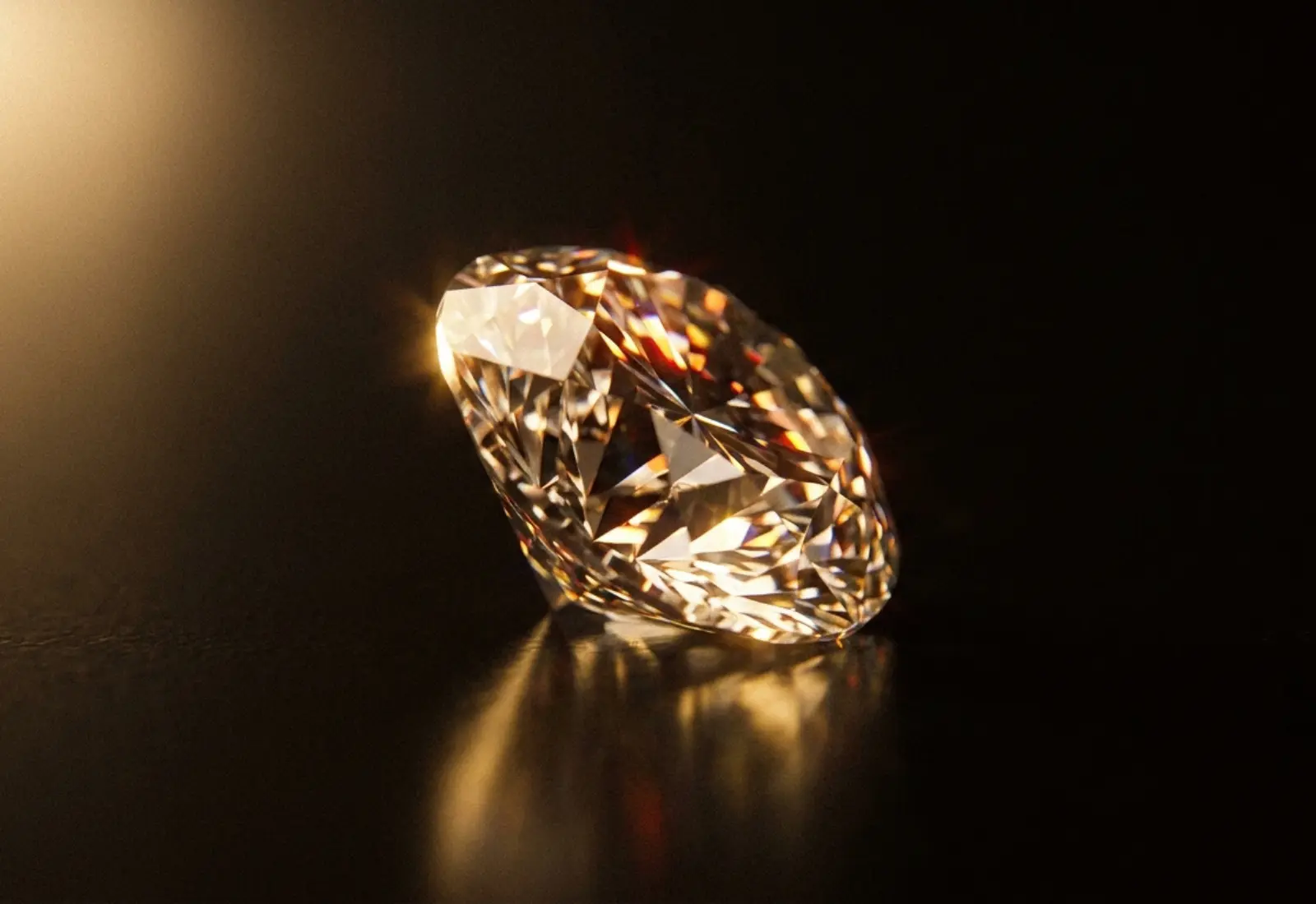 Brilliant-cut lab-grown diamond glowing in warm light