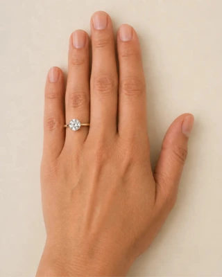 1.50 carat diamond on a hand, for size reference